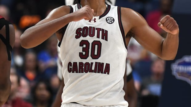 Mar 14, 2024; Nashville, TN, USA; South Carolina Gamecocks forward Collin Murray-Boyles (30) celebrates after a dunk by forward Josh Gray (33) during the second half against the Arkansas Razorbacks at Bridgestone Arena. Mandatory Credit: Christopher Hanewinckel-USA TODAY Sports